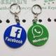 both keychains together in round next to each other on white printed paper with rings lying up for facebook in blue and whats in green